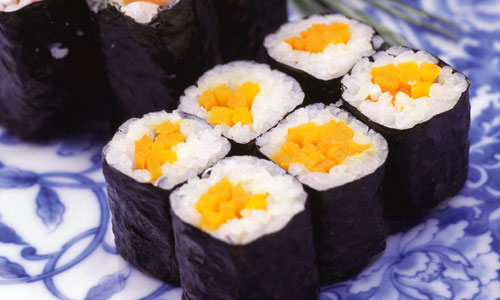 Oshinko Roll sushi pieces on a plate